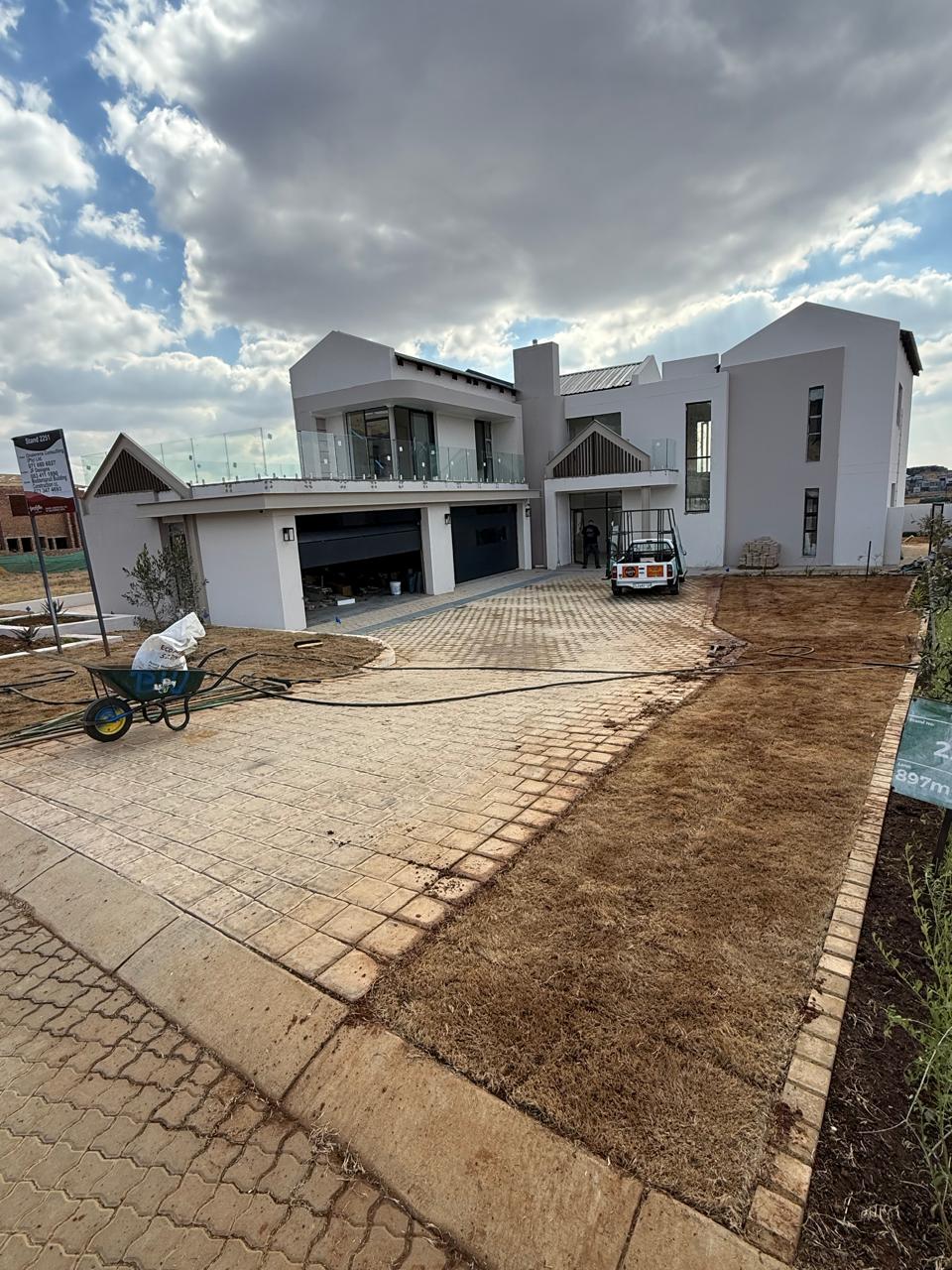 Double-storey residential build with stamped concrete driveway