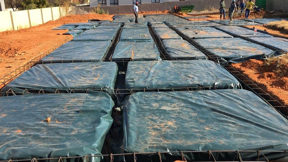 Large rib-and-block slab covered ahead of concrete topping