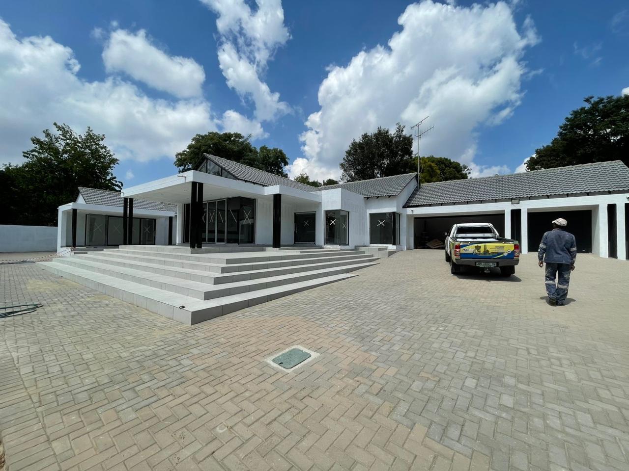Newly built residential home with feature steps and double garages
